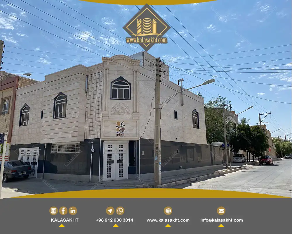 نمای ساختمان دو طبقه با سنگ مشکی و سفید مدرن